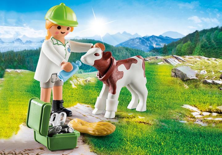 Vet with calf